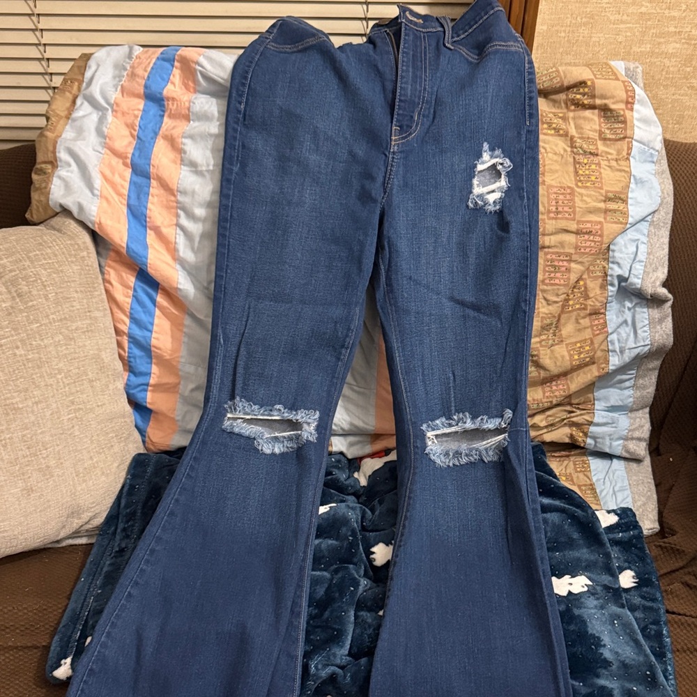 Vibrant Blue Flare Jeans with Distressed Details